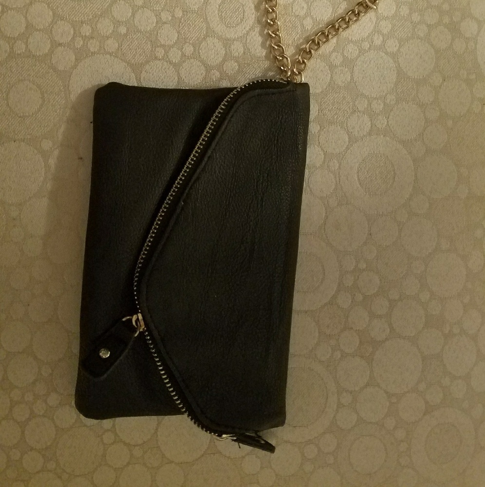 Black clutch with chain wristlet